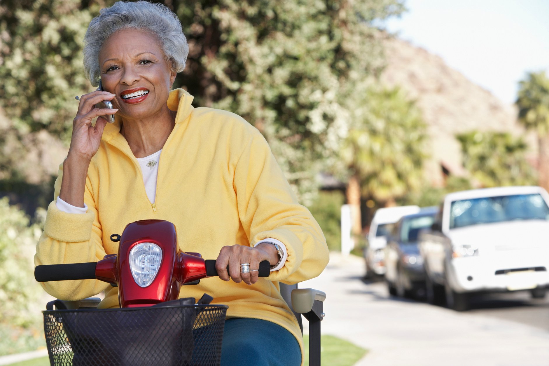 Senior on mobility scooter